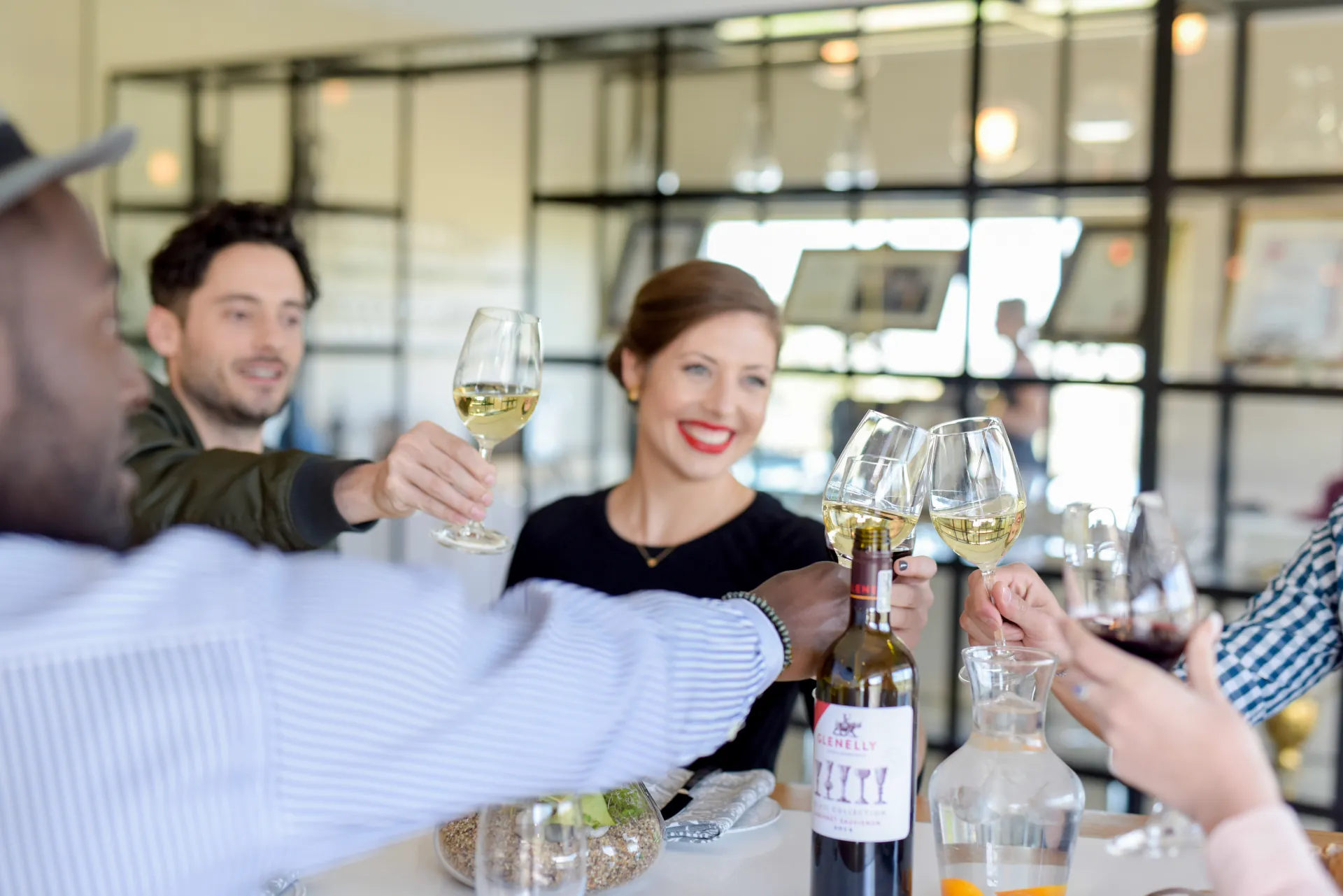 Guests enjoying a wine tasting at Glenelly