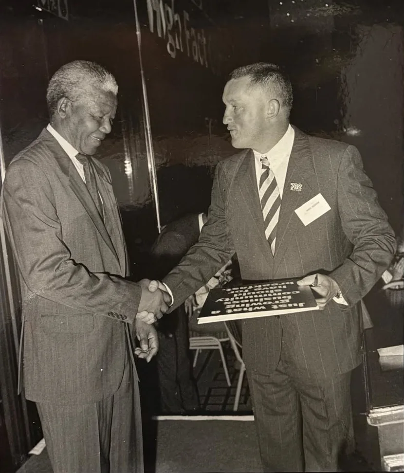 John Robbie being awarded by Nelson Mandela