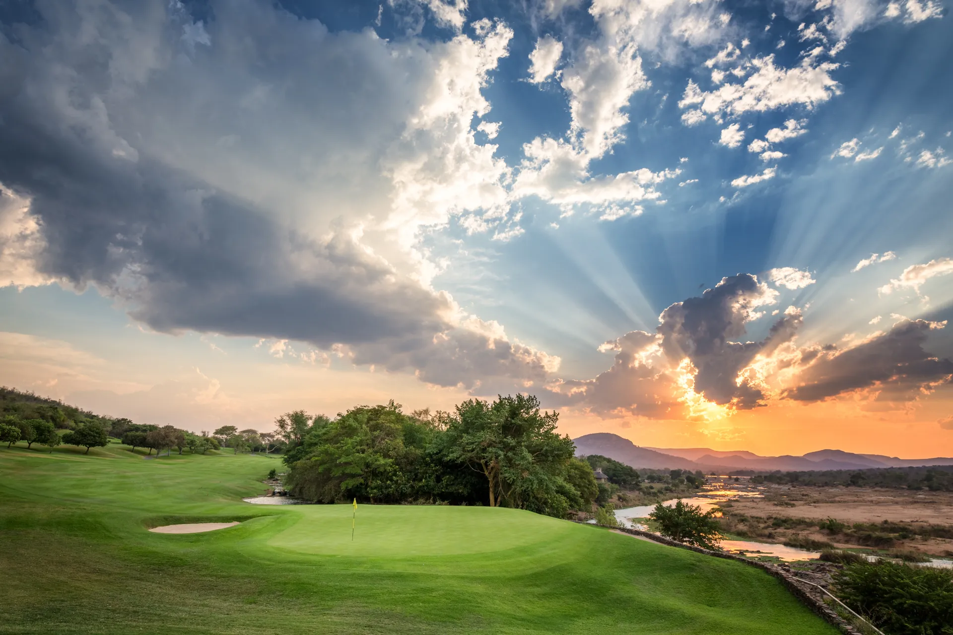 Golf course beside a river at Leopard Creek
